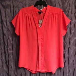 Bright colored flowing blouse